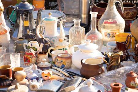 old kitchen utensils are sold at the bazaar in ukraine on the street, a collection of vintage...