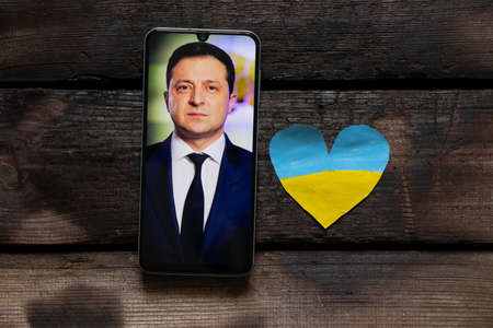 Ukraine Dnepr 10.03.2022 - Portrait of the President of Ukraine Volodymyr Zelensky in the phone as a...