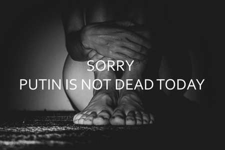 Legs of a girl in the basement of a house in the corner, darkness and text unfortunately Putin is...