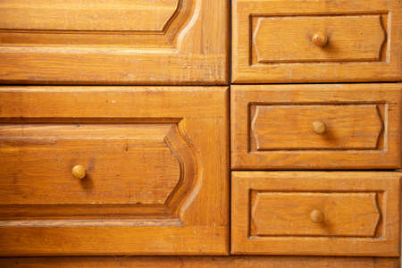 Old kitchen wooden brown cabinet as background ,kitchen furniture,cabinet door