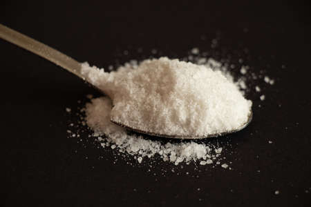 Teaspoon and rock salt, spices and seasonings, food salt, spoon of saltの写真素材