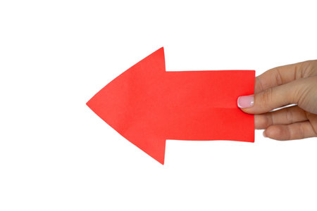 Red forward arrow in the girl's hand on a white background, red arrow sign