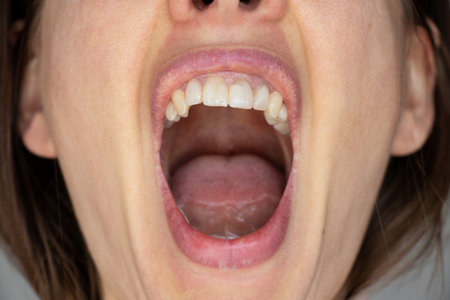 Open female mouth closeup ,tongue and mouthの写真素材