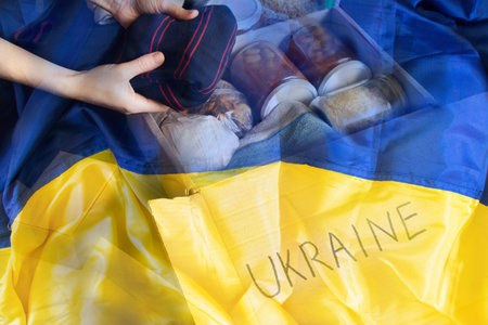 Collection of humanitarian food set for Ukraine against the background of the flag of Ukraine, food set, warの写真素材