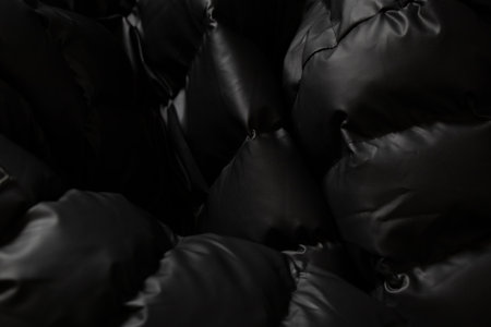 background of a black puffer jacket