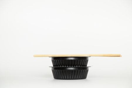 Plastic packaging for sushi on a white background