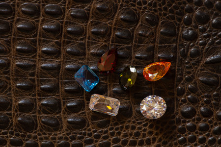 many gems on an isolated background of different colorsの写真素材