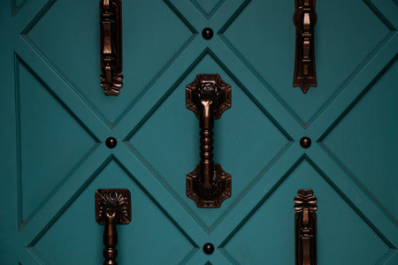 door handle on an old blue door on a residential buildingの写真素材