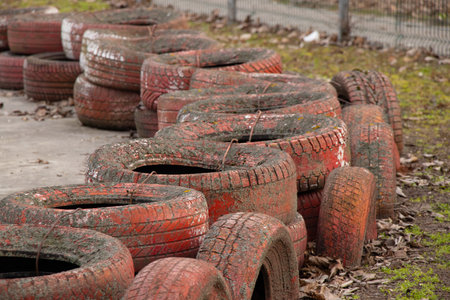 old tires at the racetrack in the afternoon in the parkの写真素材