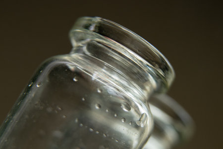 mpty glass medicine vial macro photo,