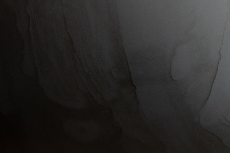 Black background with water stains and rays of light as a background, blackの写真素材