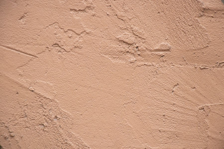 light wall of a house close-up as a backgroundの写真素材