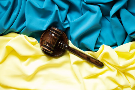 Judge's gavel on the background of the flag of Ukraine, law in Ukraineの写真素材