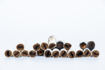 Cigarettes lie on a white background, tobaccoの写真素材