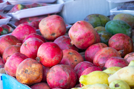pomegranate in a bazaar in Egypt close-up on a store counterの写真素材