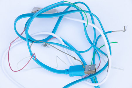 heap of cut usb wires on white backgroundの写真素材