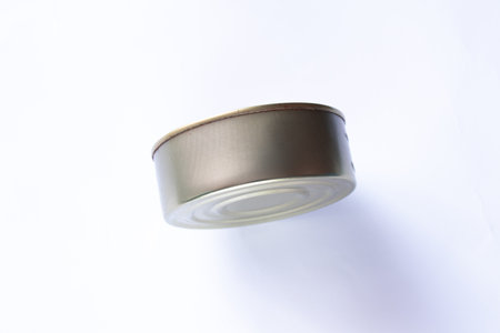 clean empty tin can on white background