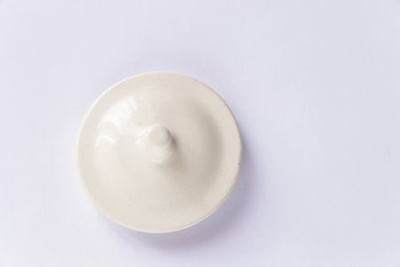 white glass lid on a white backgroundの写真素材