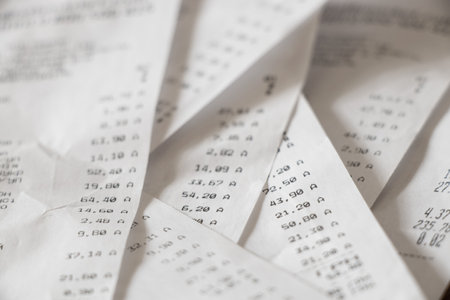 Receipts from Ukrainian grocery stores as a background, a lot of receipts, high pricesの写真素材