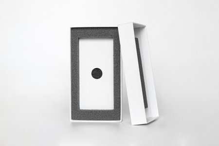 White new empty box and cover for phone on white background, empty box
