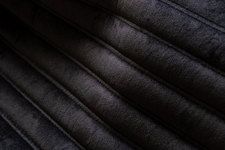 Black striped soft suede fabric as background,black background,black fabricの写真素材