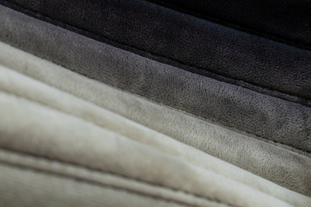 Black with transition to gray striped soft suede fabric as a background, black background, black fabricの写真素材