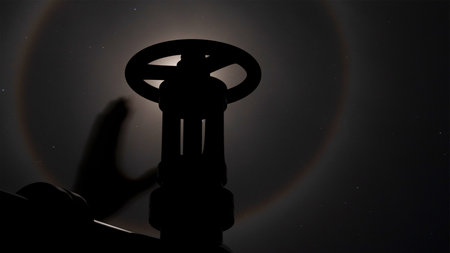3d model of gas pipe with pressure against valve background of hand in night sky, gas pipelineの写真素材