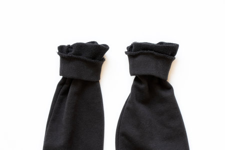 Sleeves of black cotton sports sweatshirt on white background close-upの写真素材