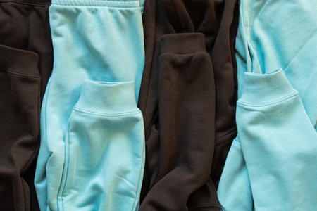 Sportswear light blue and black as background, sports suits, fashion, clothesの写真素材