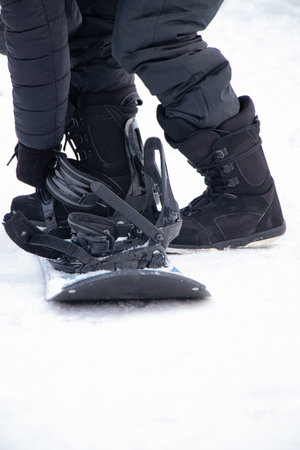 Snowboarder rides a snowboard, winter sports, winter holidaysの写真素材