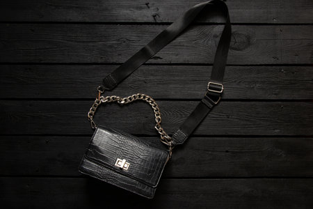 Black women small crocodile leather shoulder bag on black board fashion bagの写真素材
