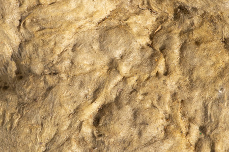 Texture of construction glass wool close-up, glass wool for dulling walls and pipesの写真素材