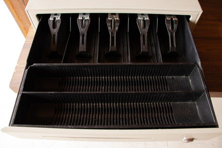Open cash drawer empty, storage space, cash registerの写真素材