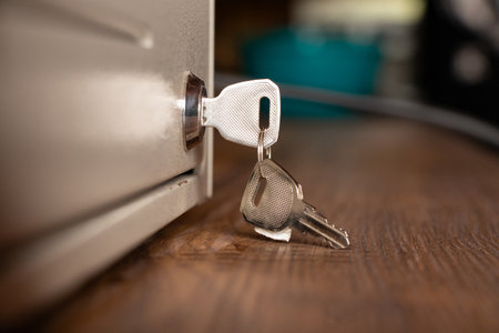 Cash drawer keys on table, cash drawer for storing moneyの写真素材