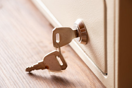 Cash drawer keys on table, cash drawer for storing moneyの写真素材
