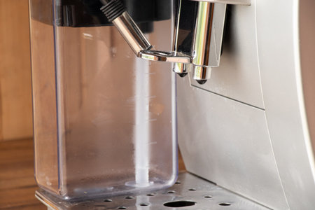 Coffee machine nozzle gray close-up, household coffee machineの写真素材
