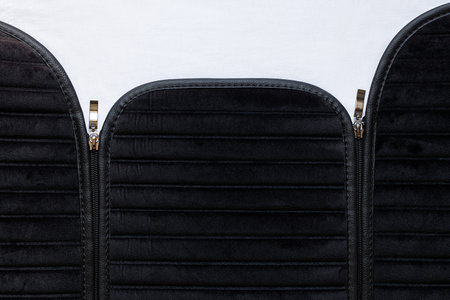 Black suede car seat cover, zipper cover texture, auto accessory, car interiorの写真素材