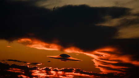 UFO in the sky against a dramatic sunset with dark clouds - 3D rendering of a flying saucer against an apocalyptic skyの写真素材