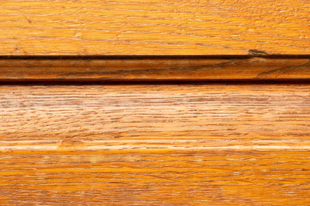 Natural wood background with horizontal cutouts close-up, wood texture for design, decoration, furniture and construction projectsの写真素材