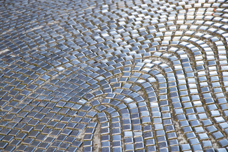 Metal cubes laid out in a wavy pattern, abstract background of shiny tiles reflecting lightの写真素材