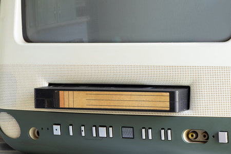 Old TV with a cassette in the kitchen - retro equipment for watching movies and news, retro TV