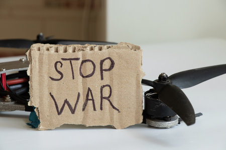 Combat drone with STOP WAR sign, anti-war message against the background of a Russian drone on a white background, messageの写真素材