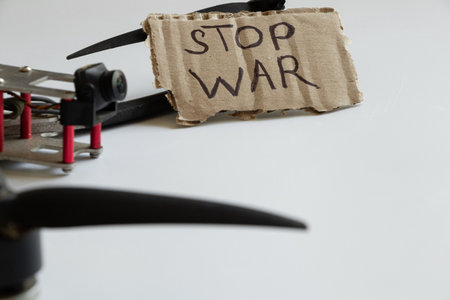 Combat drone with STOP WAR sign, anti-war message against the background of a Russian drone on a white background, messageの写真素材