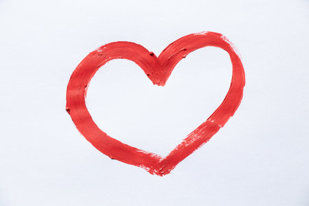 Red watercolor outline heart, hand drawn on white background as a symbol of love, Valentine's Day and romanceの写真素材