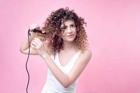 Beautiful woman with amazing curlsの写真素材