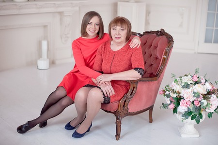 Mature Mother And Daughter Hugging.の写真素材