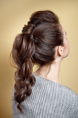 Rear view of female hairstyle volume braid.の写真素材