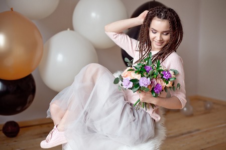 Smiling woman with dreadlocks hairstyle.の写真素材
