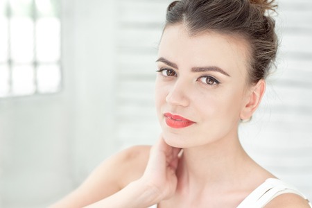 close-up woman portarat indoor on white bright backgroundの写真素材