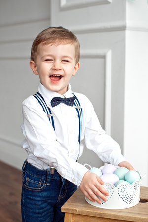 Easter day. Modern Family preparing for Easter. Having fun on Easter egg huntの写真素材
